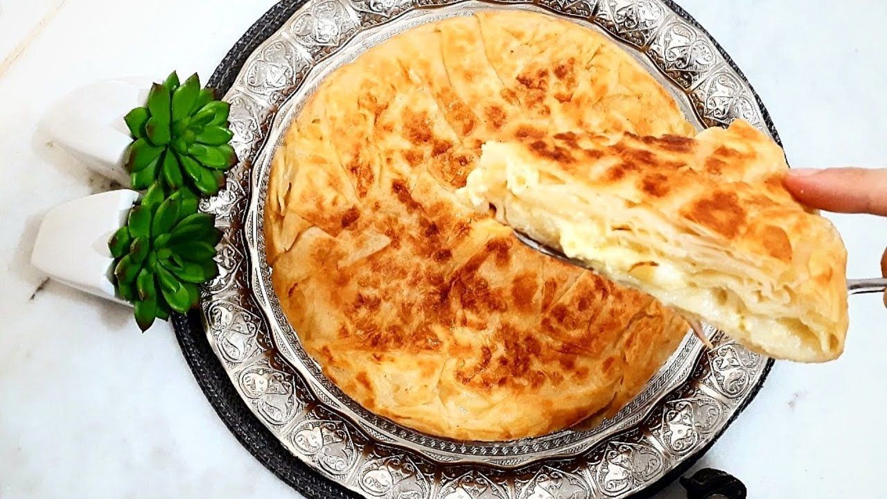Fırınsız börek tarifi arayanlar favoriniz olacak: Dışı çıtır,  içi sulu yumuşacık Tava Böreği! 4